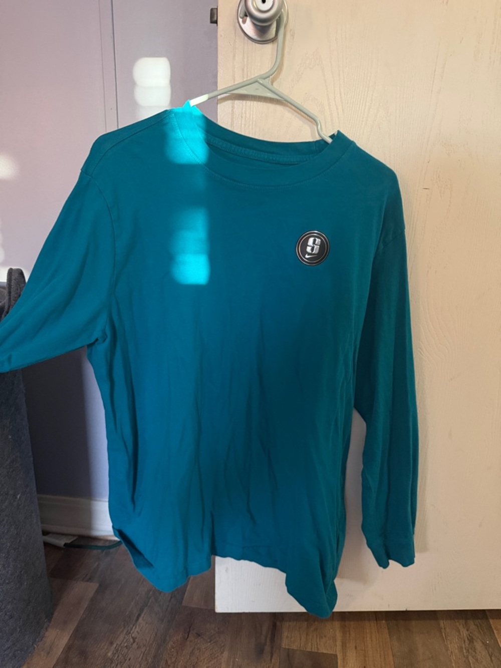 Long-Sleeve Teal Graphic Tee with Chest Emblem